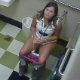 A hidden camera installed in a workplace restroom records a girl taking a small shit and then wiping herself. No audio.